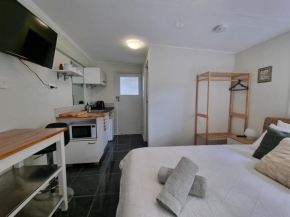 Self contained room with bathroom and kitchenette